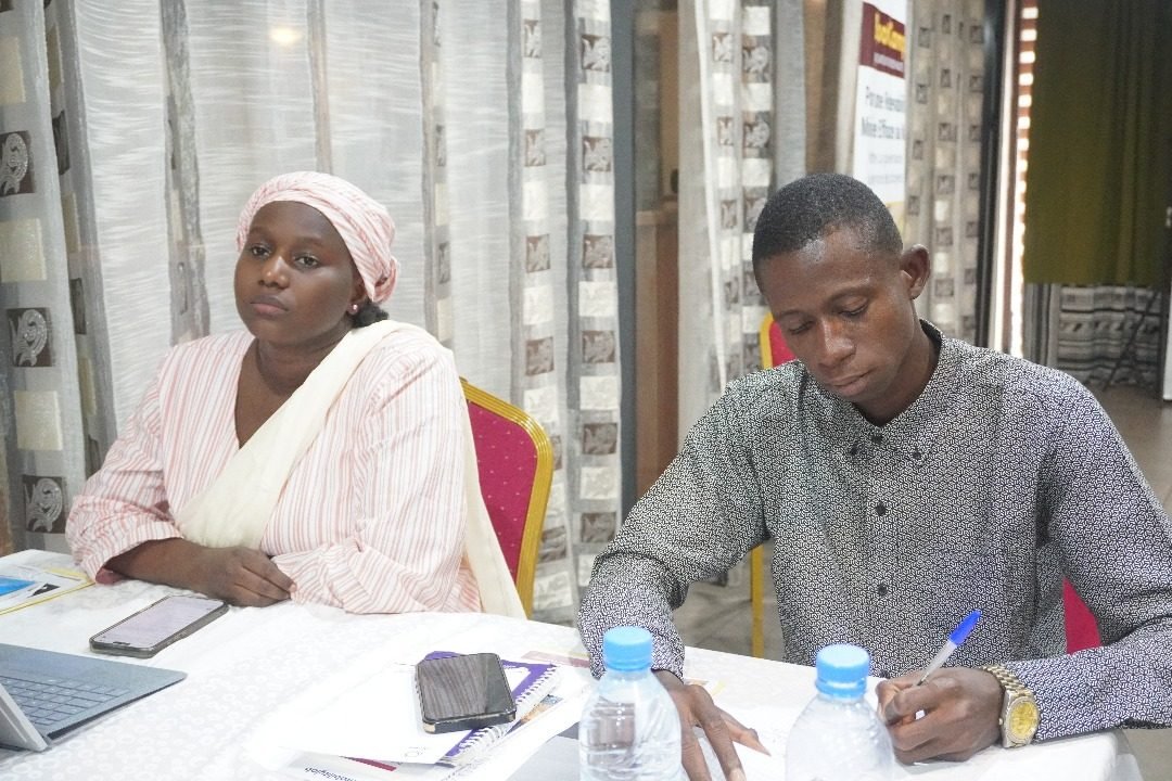 Participants suivant les travaux de groupe lors du BootCamp